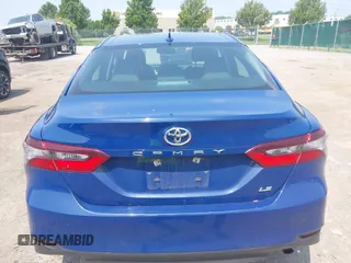 2023 Toyota Camry LE z VIN 4T1R11AK9PU180068, wystawiony jako IAAI lot #42483656 z przebiegiem 59 312 mil mil oraz . Historia ofert i sprzedaży dostępna na DreamBid. Obrazek 16.