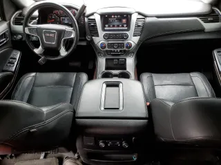 2015 GMC Yukon SLT z VIN 1GKS2BKCXFR269881, wystawiony jako Copart lot #57678175 z przebiegiem 256 703 mil mil oraz Czysty tytuł • Clean title. Historia ofert i sprzedaży dostępna na DreamBid. Obrazek 8.