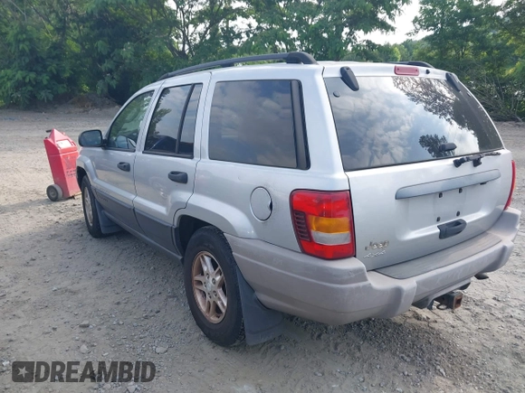 2004 Jeep Grand Cherokee Laredo z VIN 1J4GW48S54C106405, wystawiony jako IAAI lot #42315689 z przebiegiem 104 416 mil mil oraz . Historia ofert i sprzedaży dostępna na DreamBid. Obrazek 3.
