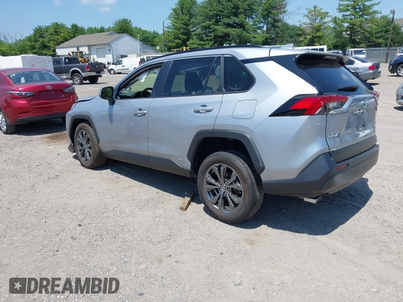 2022 Toyota RAV4 Hybrid XLE Premium with VIN JTMB6RFV1ND063963, listed as a IAAI auction lot 42550907 with 35,012 mi miles and . Bid and sale history available at DreamBid. Image 3.