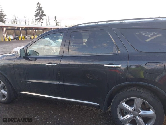 2013 Dodge Durango Citadel with VIN 1C4SDJET1DC686804, listed as a IAAI auction lot 41659284 with 125,139 mi miles. Bid and sale history available at carsss.com. Image 14.