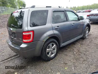 2010 Ford Escape Limited z VIN 1FMCU9EGXAKA70120, wystawiony jako IAAI lot #42330489 z przebiegiem 179 604 mil mil oraz . Historia ofert i sprzedaży dostępna na DreamBid. Obrazek 4.