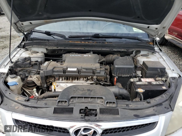 2009 Hyundai Elantra Touring z VIN KMHDC86E29U038194, wystawiony jako Copart lot #57483375 z przebiegiem 218 337 mil mil oraz Szkoda całkowita • Salvage title. Historia ofert i sprzedaży dostępna na DreamBid. Obrazek 11.