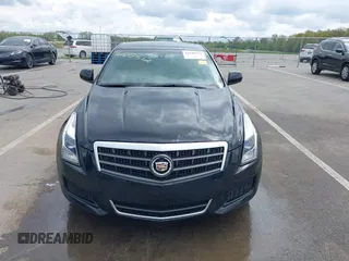 2014 Cadillac ATS Standard AWD z VIN 1G6AG5RX7E0131482, wystawiony jako IAAI lot #42188512 z przebiegiem 53 941 mil mil oraz . Historia ofert i sprzedaży dostępna na DreamBid. Obrazek 12.