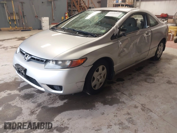 2006 Honda Civic Cpe LX with VIN 2HGFG126X6H532696, listed as a IAAI auction lot 42016264 with 209,509 mi miles. Bid and sale history available at carsss.com. Image 2.