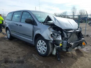 2014 Dodge Grand Caravan SE with VIN 2C4RDGBG6ER475051, listed as a IAAI auction lot 41857218 with 230,842 mi miles and . Bid and sale history available at DreamBid. Image 1.