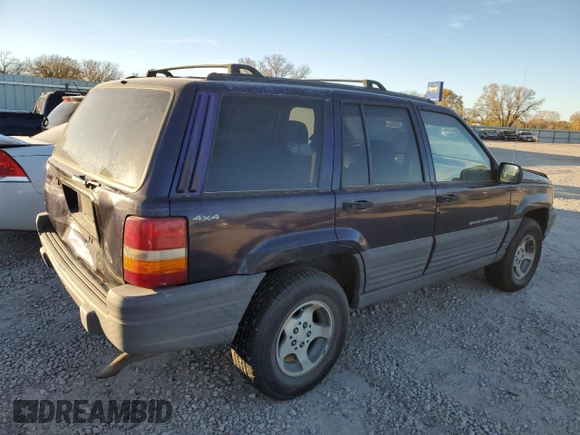 1997 Jeep Grand Cherokee Laredo with VIN 1J4GZ58S7VC685900, listed as a Copart auction lot 82105214 with 151,036 mi miles and Salvage Title. Bid and sale history available at carsss.com. Image 3.