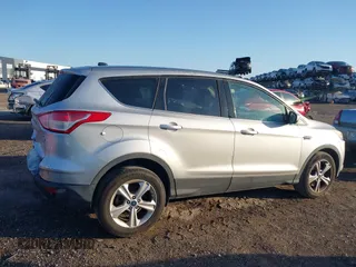 2015 Ford Escape SE with VIN 1FMCU0G95FUA44739, listed as a IAAI auction lot 42030903 with 182,826 mi miles. Bid and sale history available at carsss.com. Image 13.
