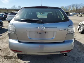 2012 Mazda CX-7 i SV z VIN JM3ER2AM2C0412683, wystawiony jako Copart lot #53774075 z przebiegiem 196 344 mil mil oraz Czysty tytuł • Clean title. Historia ofert i sprzedaży dostępna na DreamBid. Obrazek 6.