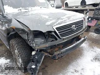 2000 Lexus LX 470 with VIN JT6HT00W9Y0096647, listed as a IAAI auction lot 41376347 with 231,916 mi miles and . Bid and sale history available at DreamBid. Image 6.