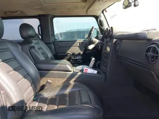 2006 Hummer H2 with VIN 5GRGN22U06H103326, listed as a IAAI auction lot 41474829 with 217,436 mi miles. Bid and sale history available at carsss.com. Image 5.