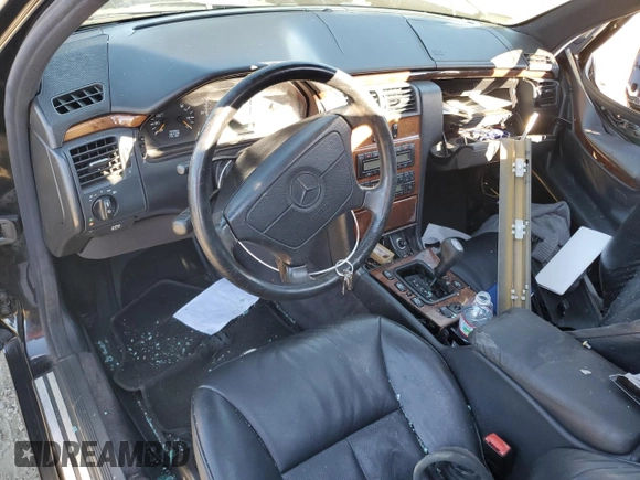 1998 Mercedes-Benz E 320 with VIN WDBJF65F8WA591263, listed as a Copart auction lot 77790804 with 204,821 mi miles and Non Repairable. Bid and sale history available at DreamBid. Image 8.