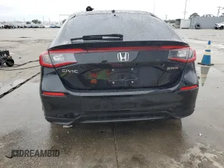 2024 Honda Civic EX-L z VIN 19XFL1H74RE001908, wystawiony jako Copart lot #79726054 z przebiegiem 30 683 mil mil oraz Szkoda całkowita • Salvage title. Historia ofert i sprzedaży dostępna na DreamBid. Obrazek 6.