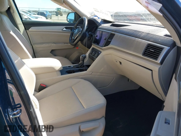 2019 Volkswagen Atlas SE with VIN 1V2DR2CA9KC506188, listed as a IAAI auction lot 41221389 with 67,593 mi miles and . Bid and sale history available at DreamBid. Image 5.