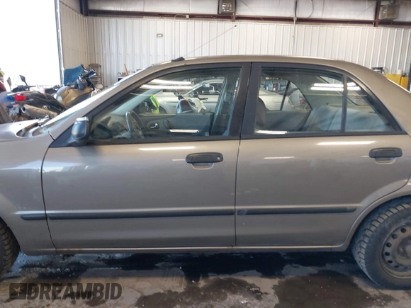 2000 Mazda Protege DX with VIN JM1BJ2225Y0278677, listed as a IAAI auction lot 42056816 with 188,552 mi miles and . Bid and sale history available at DreamBid. Image 14.