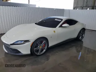 2024 Ferrari Roma z VIN ZFF98RNA4R0301164, wystawiony jako Copart lot #61120144 z przebiegiem 1263 mil mil oraz Nie do naprawy. Historia ofert i sprzedaży dostępna na DreamBid. Obrazek 1.