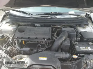 2010 Kia Forte EX z VIN KNAFU4A22A5828445, wystawiony jako Copart lot #51564313 z przebiegiem 114 961 mil mil oraz Szkoda całkowita • Salvage title. Historia ofert i sprzedaży dostępna na DreamBid. Obrazek 11.
