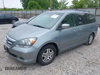 2005 Honda Odyssey EX-L z VIN 5FNRL386X5B038143, wystawiony jako IAAI lot #42149398 z przebiegiem 243 002 mil mil oraz . Historia ofert i sprzedaży dostępna na DreamBid. Obrazek 2.
