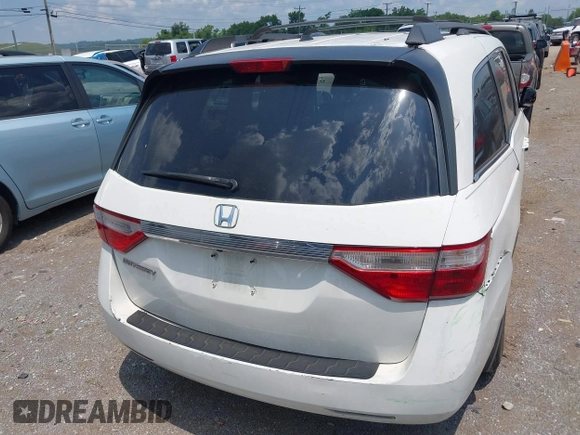 2012 Honda Odyssey EX-L with VIN 5FNRL5H63CB063684, listed as a IAAI auction lot 42576742 with 170,656 mi miles and . Bid and sale history available at DreamBid. Image 16.
