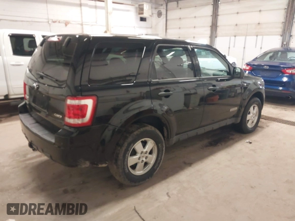 2008 Ford Escape XLT with VIN 1FMCU93108KA04863, listed as a IAAI auction lot 42131438 with 126,439 mi miles. Bid and sale history available at carsss.com. Image 4.