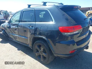 2014 Jeep Grand Cherokee Laredo with VIN 1C4RJEAG0EC580675, listed as a IAAI auction lot 41773879 with 127,714 mi miles. Bid and sale history available at carsss.com. Image 3.