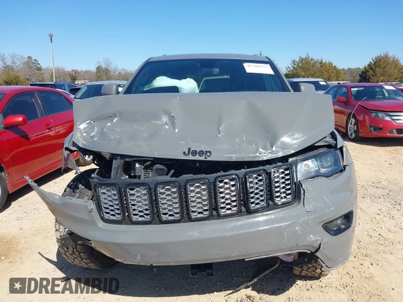 2019 Jeep Grand Cherokee Laredo E with VIN 1C4RJFAG2KC855108, listed as a IAAI auction lot 41780277 with 81,283 mi miles and . Bid and sale history available at DreamBid. Image 13.