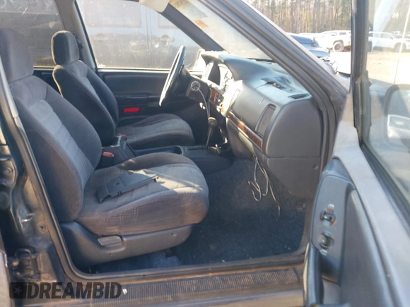 1998 Jeep Grand Cherokee Laredo with VIN 1J4FX58S7WC283734, listed as a IAAI auction lot 41267813 with 266,189 mi miles. Bid and sale history available at carsss.com. Image 5.