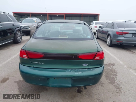 1999 Ford Escort LX z VIN 1FAFP10P1XW230023, wystawiony jako IAAI lot #42486934 z przebiegiem 41 468 mil mil oraz . Historia ofert i sprzedaży dostępna na DreamBid. Obrazek 16.