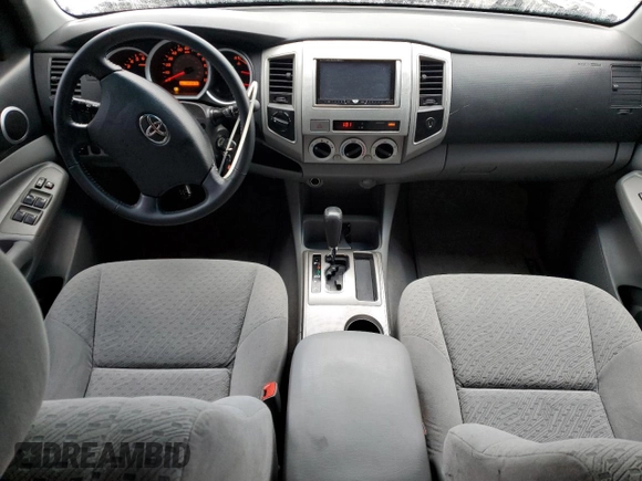 2007 Toyota Tacoma z VIN 5TEMU52NX7Z338432, wystawiony jako Copart lot #55851235 z przebiegiem 194 976 mil mil oraz Szkoda całkowita • Salvage title. Historia ofert i sprzedaży dostępna na DreamBid. Obrazek 8.