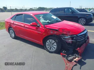 2019 Volkswagen Jetta S z VIN 3VWC57BUXKM029610, wystawiony jako IAAI lot #42334649 z przebiegiem 34 072 mil mil oraz . Historia ofert i sprzedaży dostępna na DreamBid. Obrazek 1.