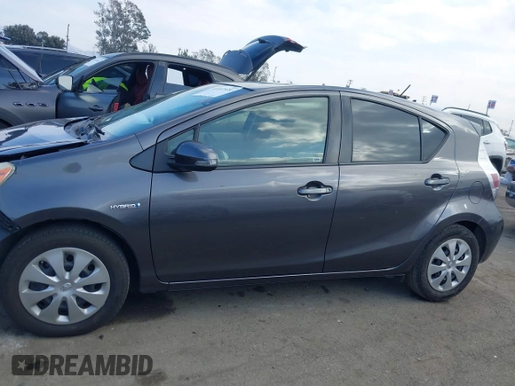 2014 Toyota Prius One with VIN JTDKDTB30E1575075, listed as a IAAI auction lot 41407539 with 150,470 mi miles and . Bid and sale history available at DreamBid. Image 15.