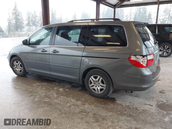 2007 Honda Odyssey EX with VIN 5FNRL38417B054717, listed as a IAAI auction lot 41955733 with 157,076 mi miles. Bid and sale history available at carsss.com. Image 3.