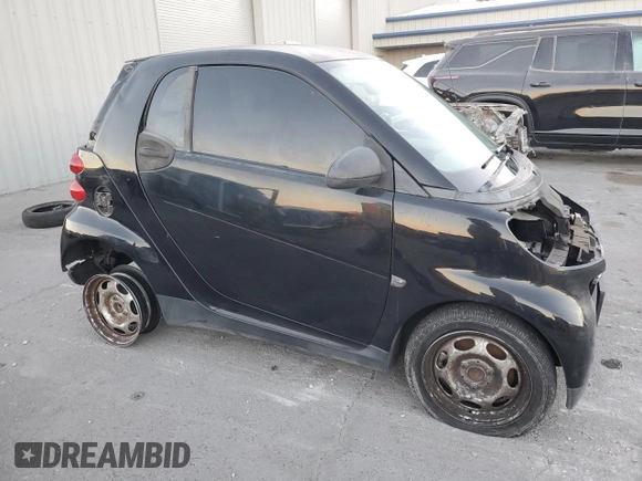 2008 Smart fortwo Pure z VIN WMEEJ31X48K150064, wystawiony jako Copart lot #42133475 z przebiegiem 103 280 mil mil oraz Szkody całkowita. Historia ofert i sprzedaży dostępna na DreamBid. Obrazek 4.