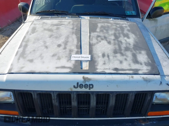 1997 Jeep Cherokee Sport with VIN 1J4FJ68S3VL551278, listed as a IAAI auction lot 41660577 with 282,264 mi miles. Bid and sale history available at carsss.com. Image 10.