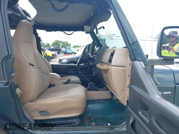 2002 Jeep Wrangler Sport with VIN 1J4FA49S52P760173, listed as a IAAI auction lot 42468550 with 201,682 mi miles and . Bid and sale history available at DreamBid. Image 5.