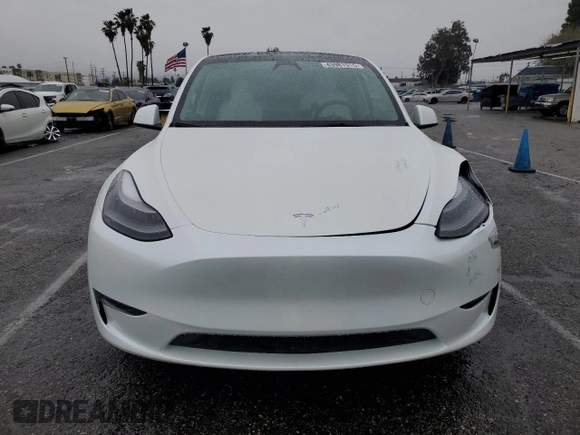2023 Tesla Model Y Performance with VIN 7SAYGDEF1PF809654, listed as a Copart auction lot 43981915 with 16,401 mi miles and Salvage Title. Bid and sale history available at DreamBid. Image 5.