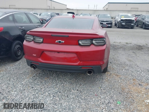 2021 Chevrolet Camaro 1LT with VIN 1G1FB1RX9M0107010, listed as a IAAI auction lot 42629591 with 65,450 mi miles and . Bid and sale history available at DreamBid. Image 17.