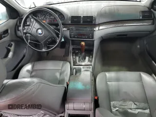 2000 BMW 3 Series 323i with VIN WBAAM3348YFP73443, listed as a Copart auction lot 54165575 with 334,761 mi miles and Salvage title. Bid and sale history available at DreamBid. Image 8.
