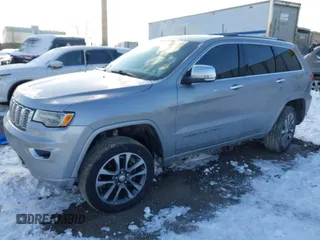 2018 Jeep Grand Cherokee High Altitude with VIN 1C4RJFCG5JC355584, listed as a IAAI auction lot 41403722 with 96,273 mi miles. Bid and sale history available at carsss.com. Image 17.