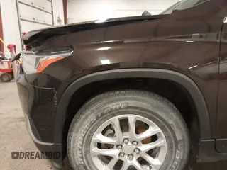 2019 Chevrolet Traverse LT Cloth z VIN 1GNERGKW1KJ158891, wystawiony jako IAAI lot #41996781 z przebiegiem 90 252 mil mil oraz . Historia ofert i sprzedaży dostępna na DreamBid. Obrazek 21.