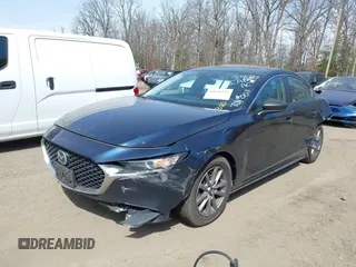 2021 Mazda 3 S with VIN 3MZBPAAL2MM253405, listed as a IAAI auction lot 41836752 with 63 mi miles and . Bid and sale history available at DreamBid. Image 17.
