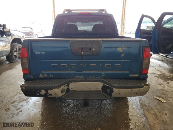 2001 Nissan Frontier 4WD SE with VIN 1N6ED27Y21C318975, listed as a Copart auction lot 61865274 with 241685 miles and Salvage Title. Bid and sale history available at carsss.com. Image 6.