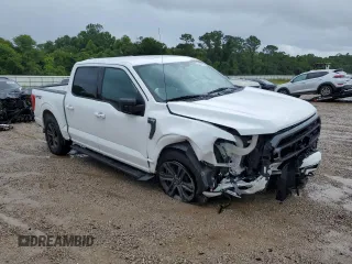 2021 Ford F-150 XL with VIN 1FTFW1E59MFA70313, listed as a Copart auction lot 60793215 with 52,387 mi miles and Salvage title. Bid and sale history available at DreamBid. Image 4.
