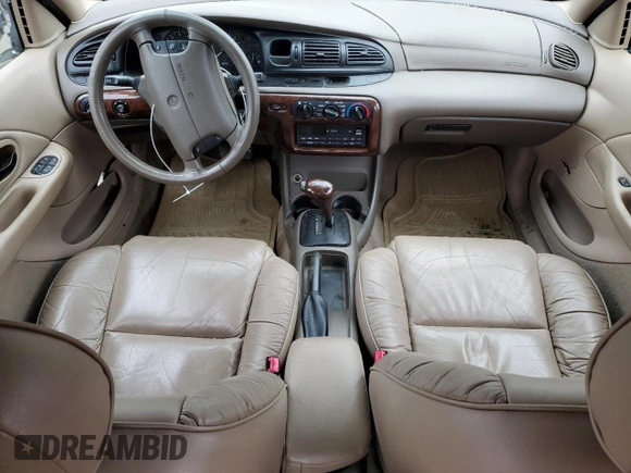 1998 Mercury Mystique z VIN 3MEFM66L4WM611303, wystawiony jako Copart lot #51298355 z przebiegiem 109 671 mil mil oraz Szkody całkowita. Historia ofert i sprzedaży dostępna na DreamBid. Obrazek 8.