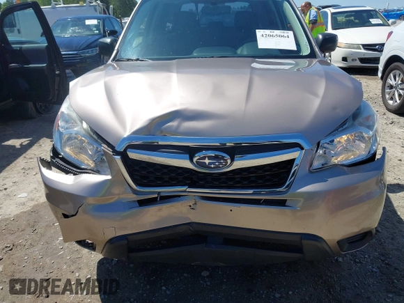 2014 Subaru Forester 2.5i with VIN JF2SJAAC4EH516103, listed as a IAAI auction lot 42065064 with 140,531 mi miles and . Bid and sale history available at DreamBid. Image 6.
