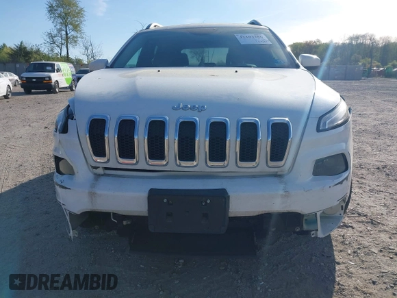 2015 Jeep Cherokee Latitude with VIN 1C4PJLCS6FW689607, listed as a IAAI auction lot 42103286 with 142,479 mi miles. Bid and sale history available at carsss.com. Image 12.