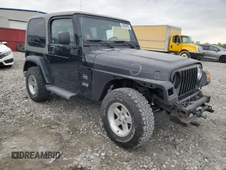 2004 Jeep Wrangler Sahara with VIN 1J4FA59SX4P713343, listed as a Copart auction lot 53608265 with 113,828 mi miles and Salvage title. Bid and sale history available at DreamBid. Image 4.