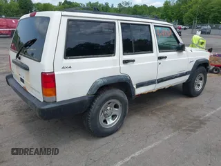 1998 Jeep Cherokee Sport z VIN 1J4FJ68SXWL243008, wystawiony jako IAAI lot #42411968 z przebiegiem 147 680 mil mil oraz . Historia ofert i sprzedaży dostępna na DreamBid. Obrazek 4.