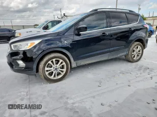 2018 Ford Escape SE z VIN 1FMCU9GD2JUC78371, wystawiony jako Copart lot #59672625 z przebiegiem 119 032 mil mil oraz Czysty tytuł • Clean title. Historia ofert i sprzedaży dostępna na DreamBid. Obrazek 1.