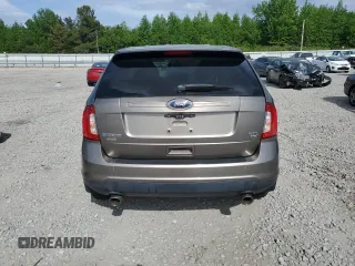 2014 Ford Edge SEL z VIN 2FMDK4JC7EBA47264, wystawiony jako Copart lot #54201255 z przebiegiem 135 408 mil mil oraz Szkoda całkowita • Salvage title. Historia ofert i sprzedaży dostępna na DreamBid. Obrazek 6.